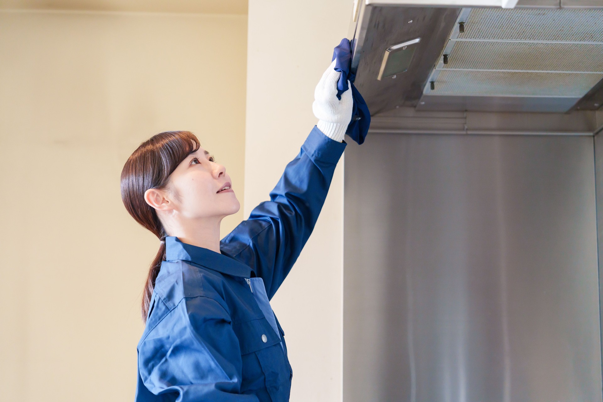 Female staff doing house cleaning